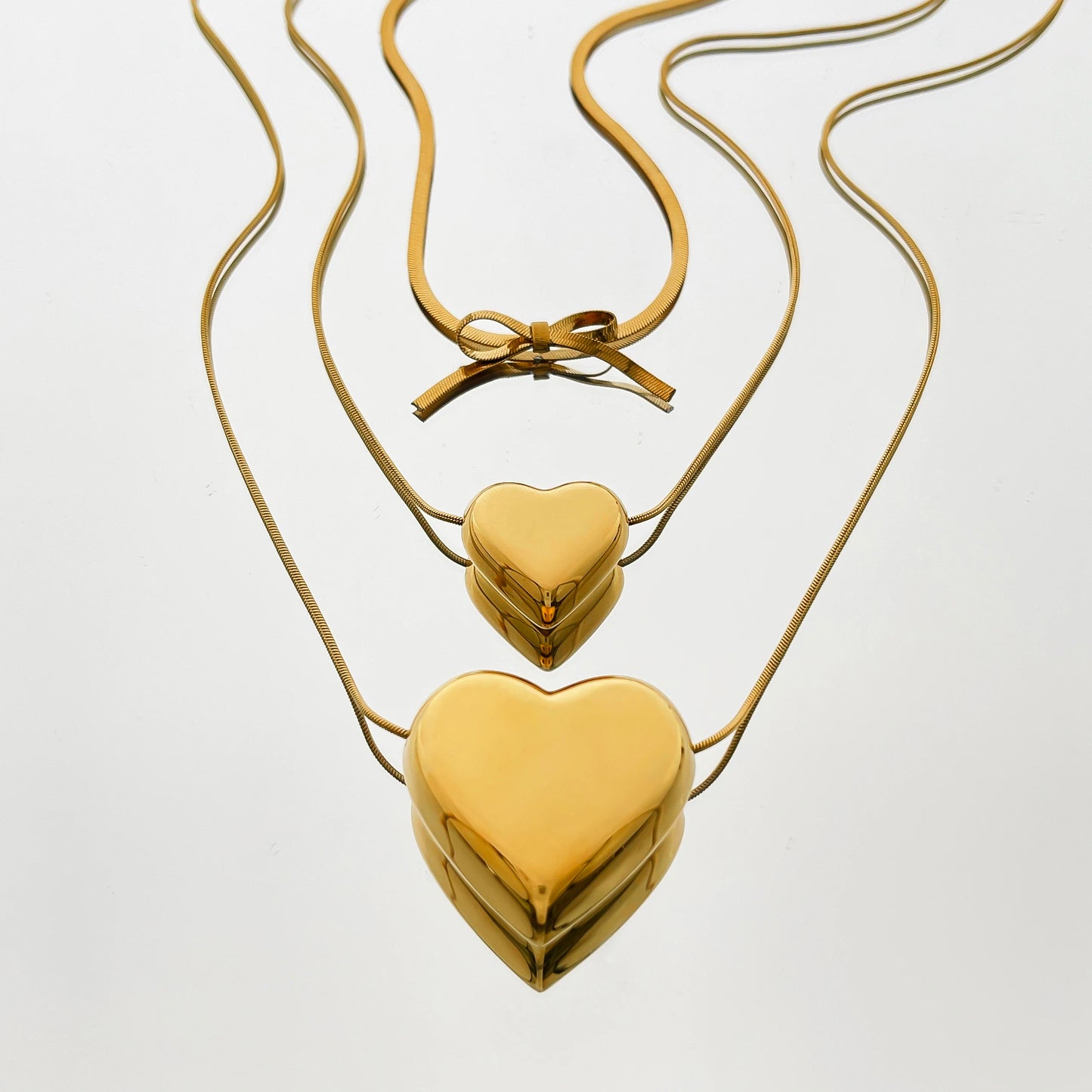 The Golden Bow Heart Necklace