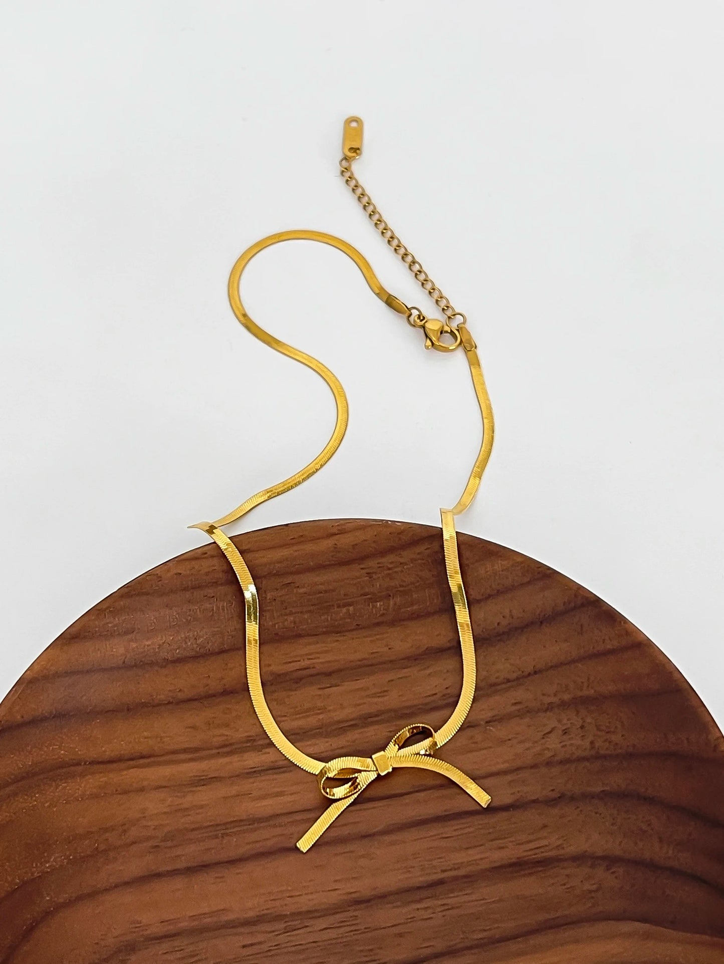 The Golden Bow Heart Necklace